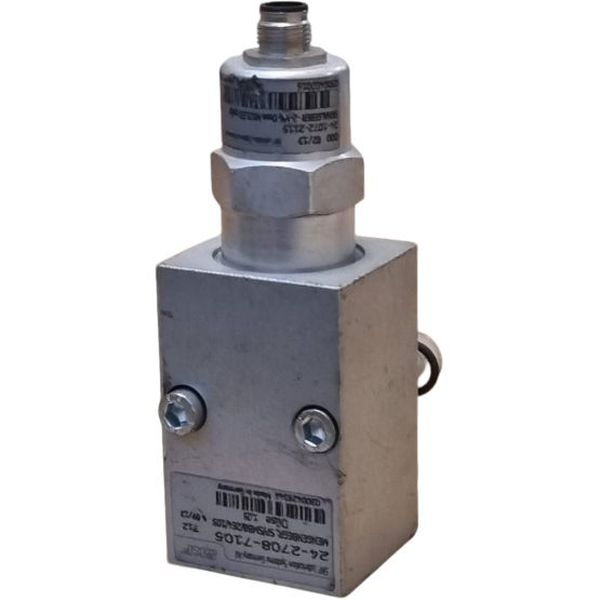 Usado em sistemas de lubrificação para dividir o fluxo da linha principal.